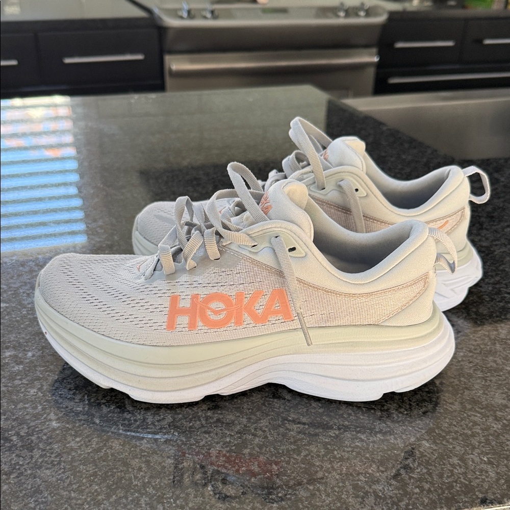 Hoka Women's Bondi 8 Sneakers in Grey and Peach
